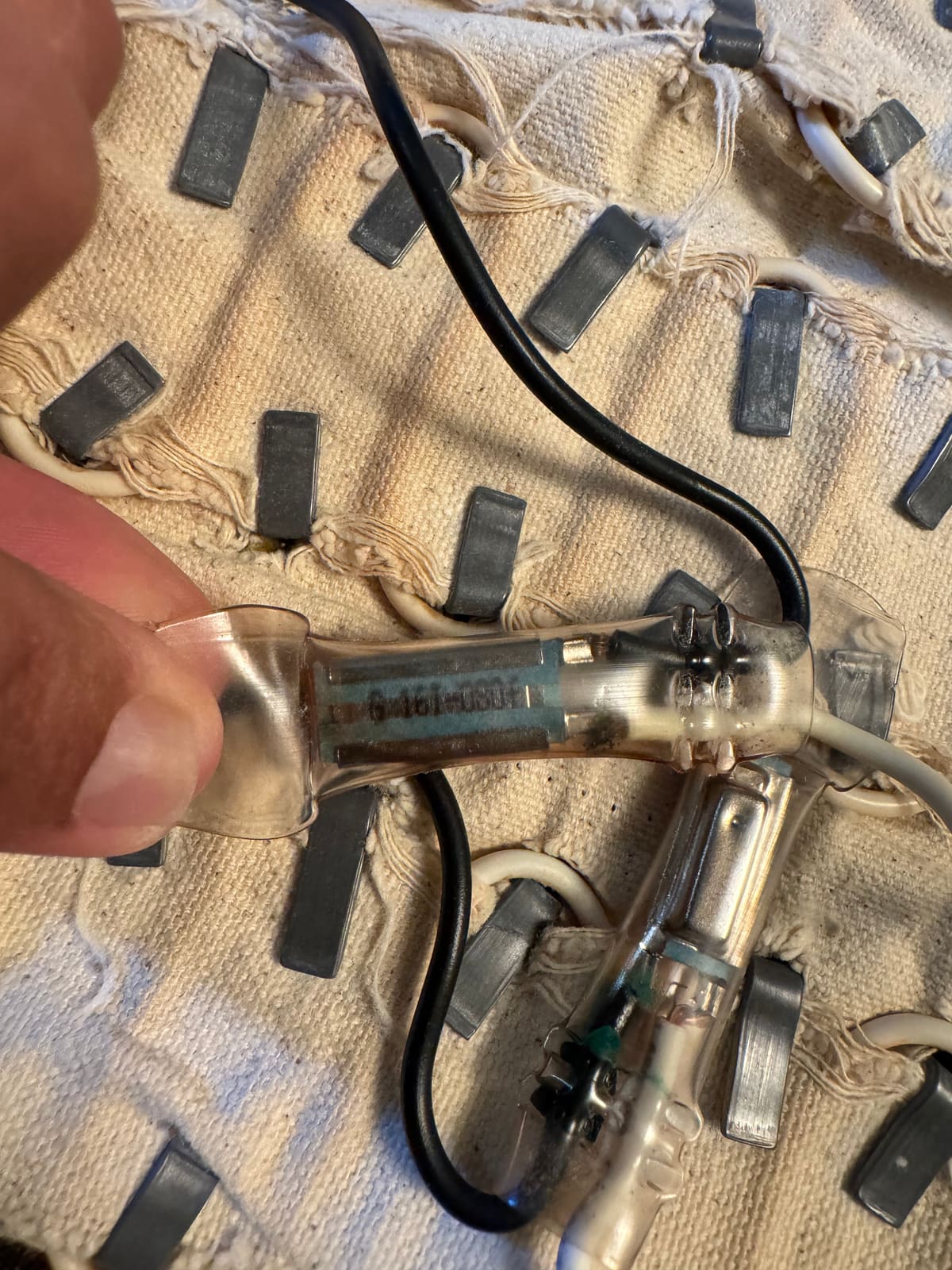 The new temperature sensor spliced in and sealed with heat shrink