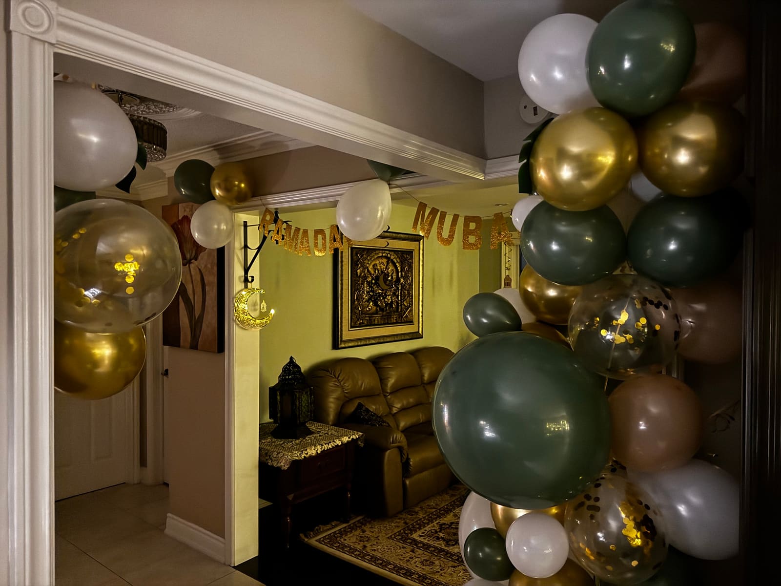 Balloon garland framing the family room doorway